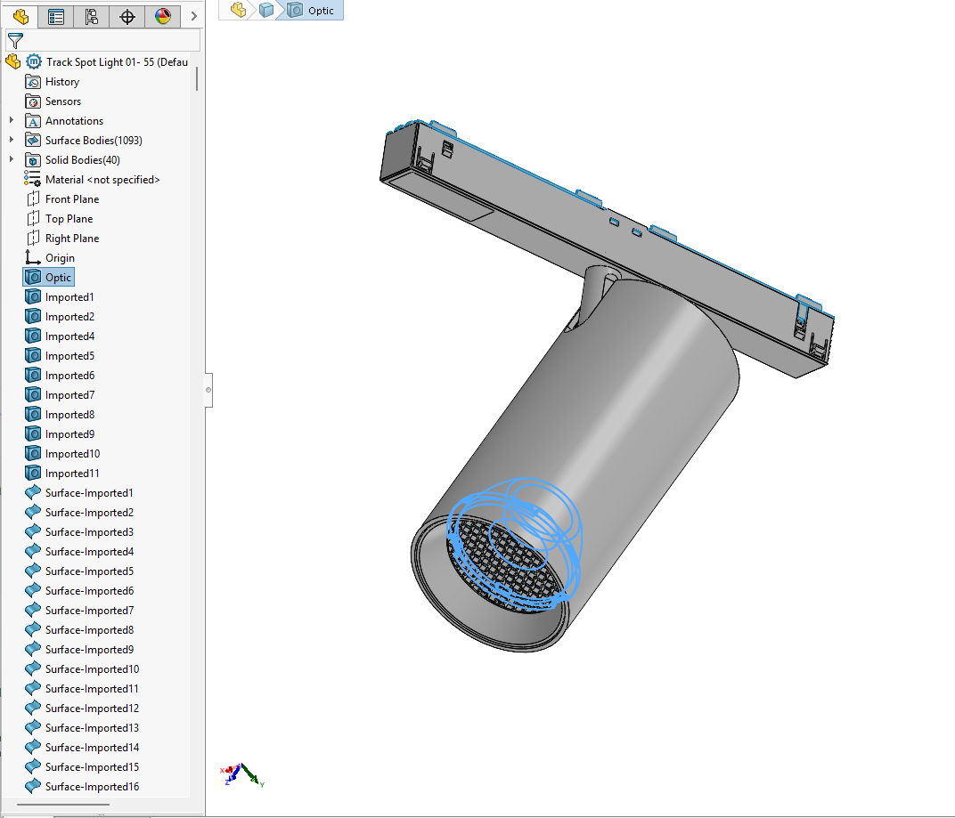 SolidWorks model tree with the light-source part named Optic near the top and separate bodies retained